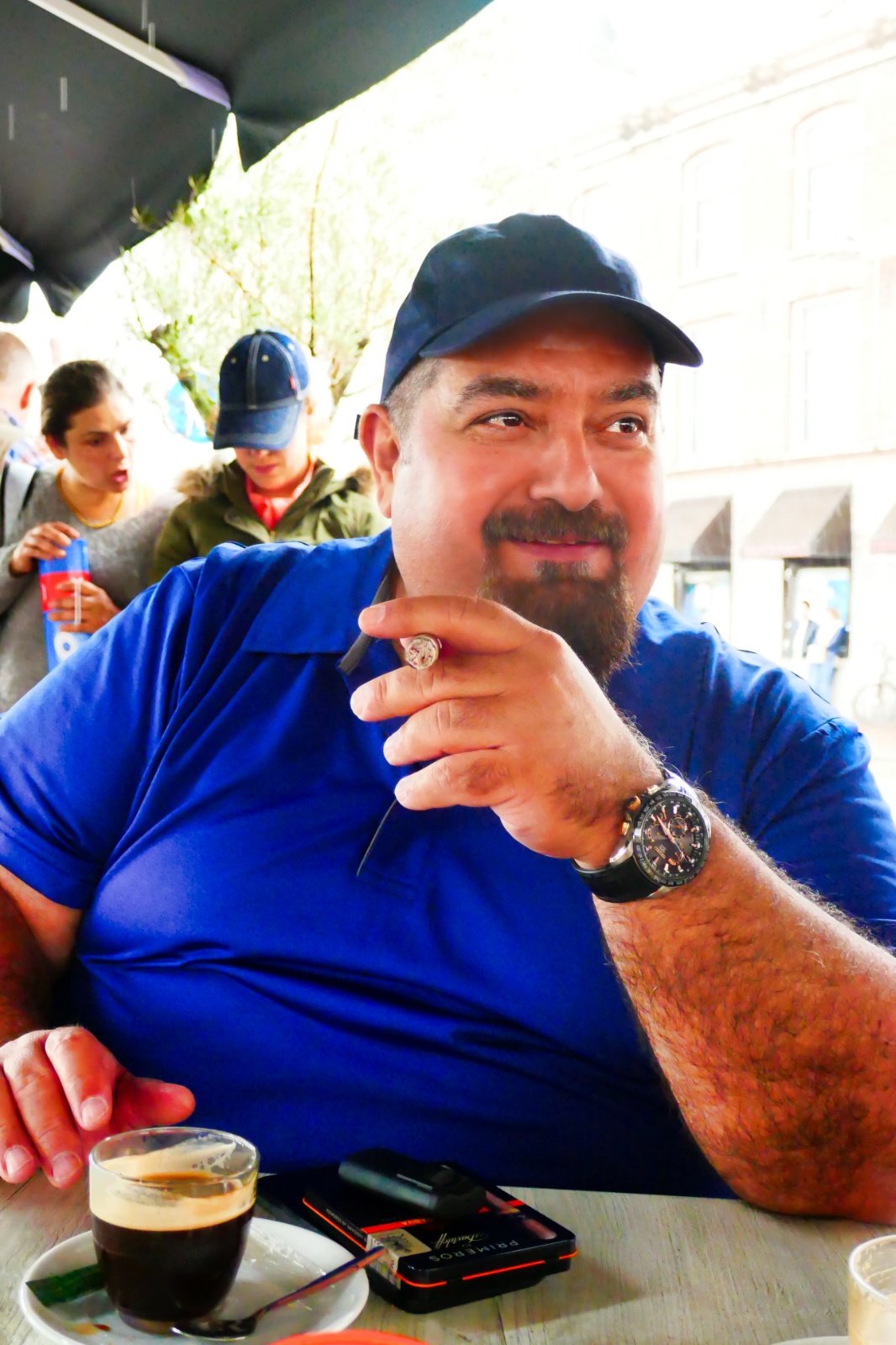 Imad smoking a cigar