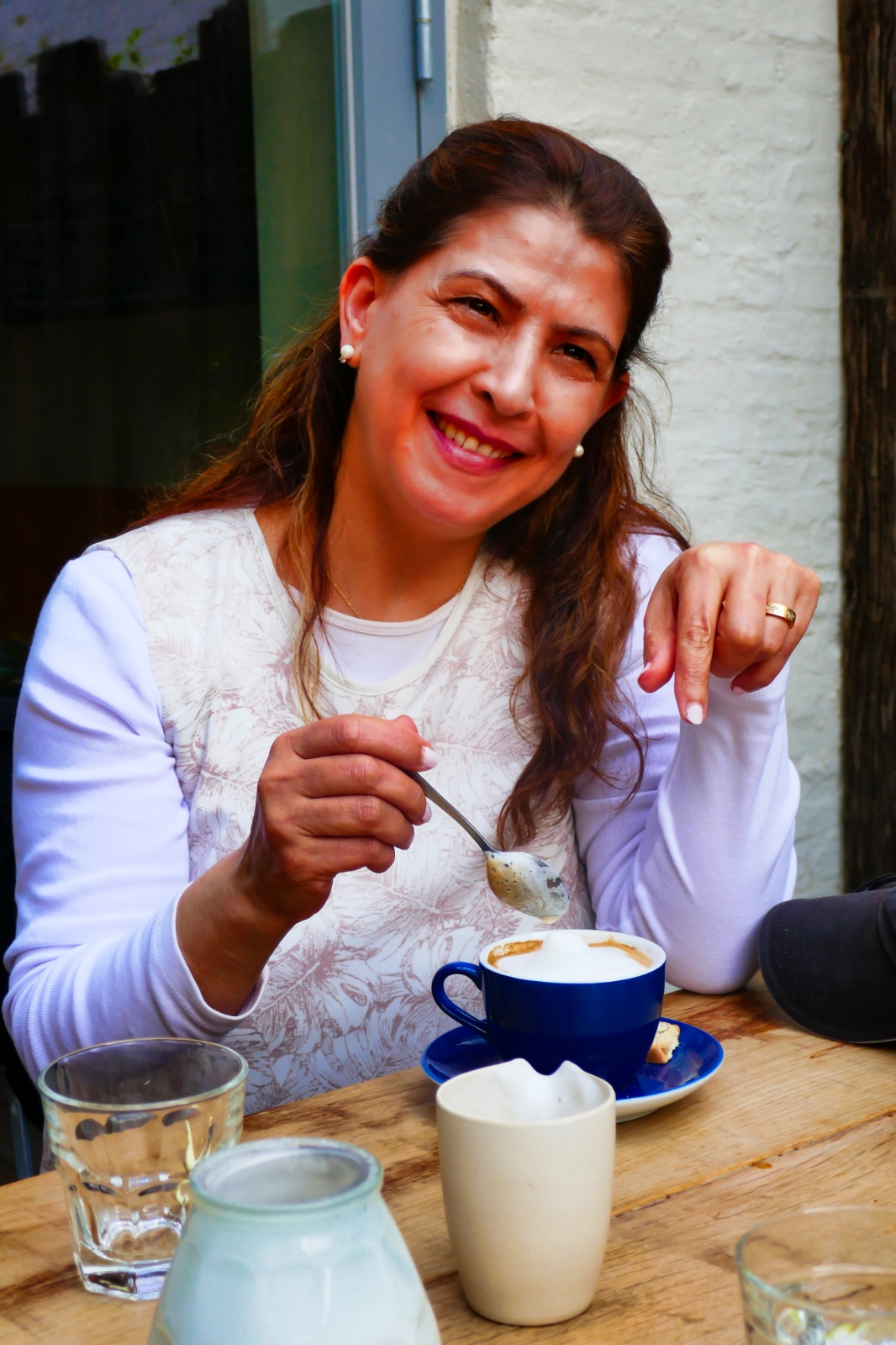 Wafa enjoying her coffee